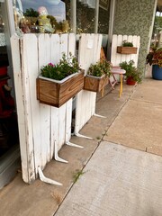 Rural downtown sidewalks and terrace with flowers