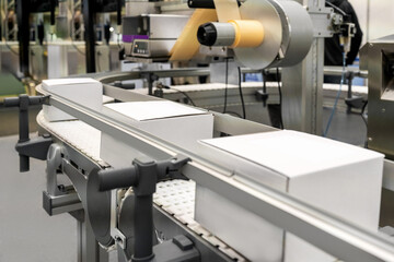 Automated solution for labeling products in a factory. Labels printing in manufacturing.