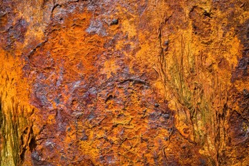 Rusty background. Multilayer rust. Metal structure at sea.
