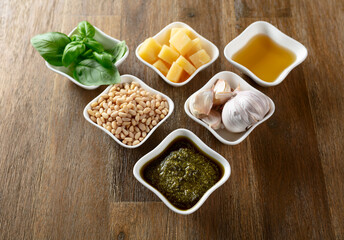Homemade pesto sauce and ingredients.
