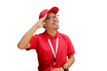 Excited Indonesian delivery man or courier celebrating Indonesian Independence Day by making a salute gesture. Isolated on a white background