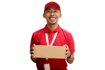 Happy Asian delivery man or courier is holding a cardboard box package parcel, smiling at the camera. Isolated on a white background, Concept of satisfaction and efficiency in delivery services