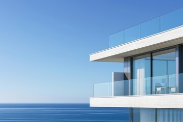 Fototapeta premium A large white building with a balcony overlooking the ocean