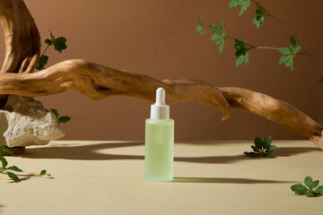 Cosmetic advertising mock up with a unbranded serum bottle of light green liquid featured in...