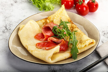 Russian pancake with salmon fish