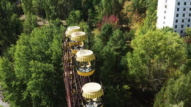 Abandoned ferris wheel in Pripyat, 38 years after the Chernobyl disaster.