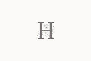 Botanical flower herbal letter monogram retro logo design template outline vector illustration