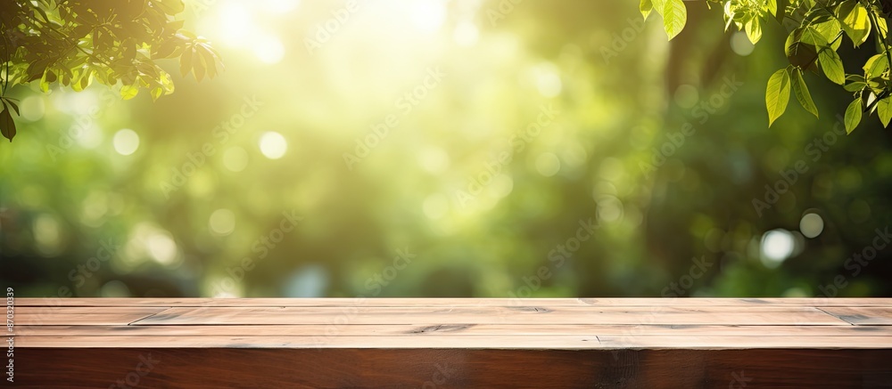 Poster outdoor template featuring a wooden table with a green sunny bokeh, ideal for showcasing your produc