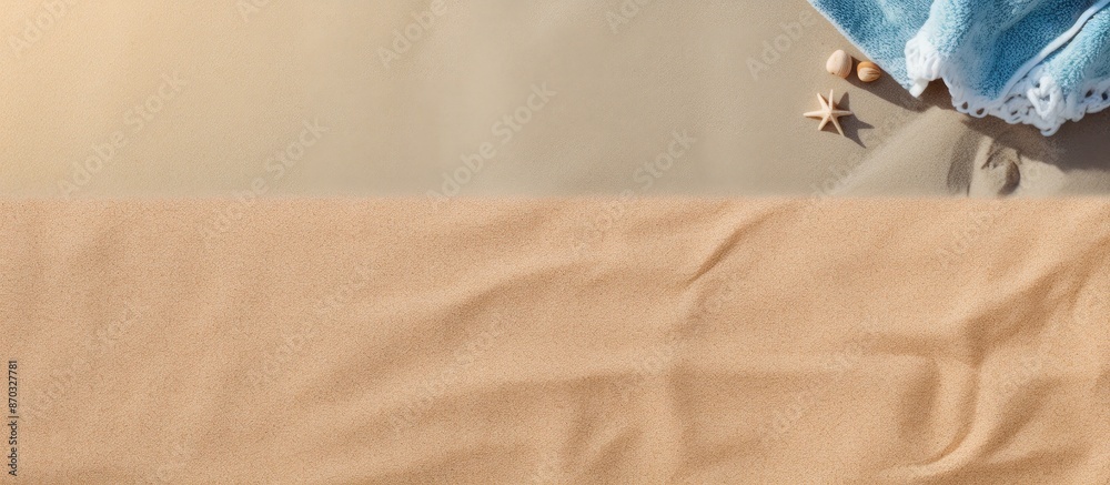 Leinwandbilder sandy beach seen from above with towel border, summer accessories, and visible sand texture, creatin
