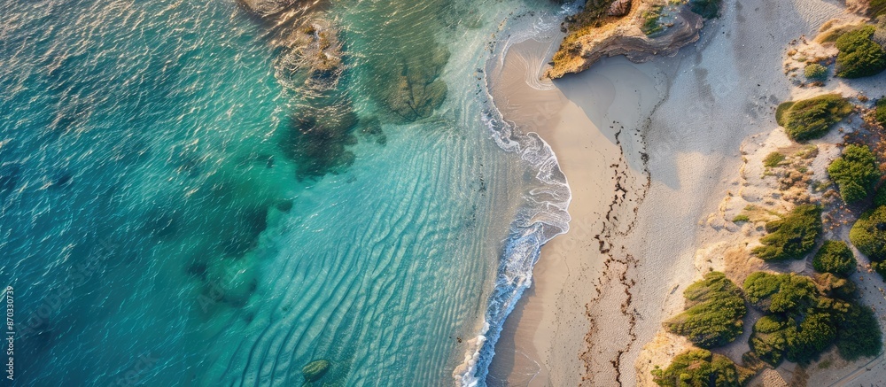 Poster Shoreline view against the ocean with a stretch of sand. with copy space image. Place for adding text or design