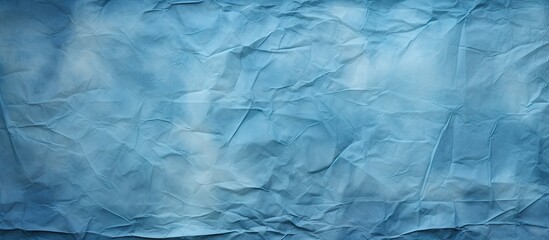 Obraz premium Textured background of crumpled blue grunge paper with copy space image.