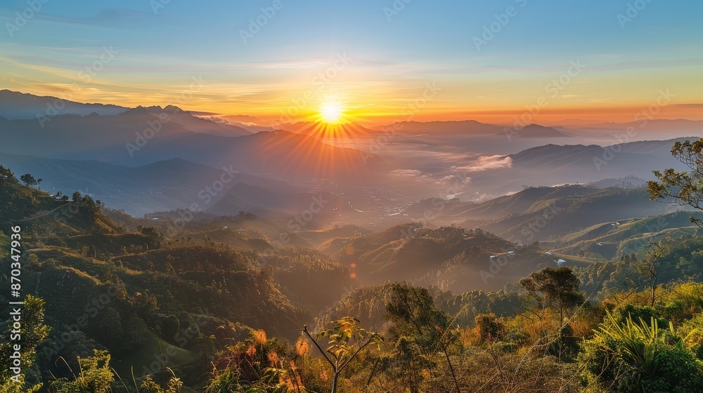 Sticker watching the sunrise from a mountain peak, the golden rays gradually illuminate the valleys below, b