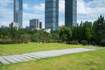 city park with modern building background in shanghai