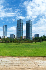Obraz premium city park with modern building background in shanghai