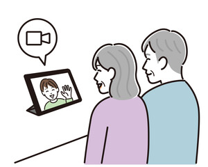 孫とビデオ通話する老夫婦