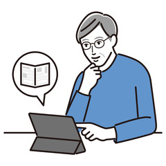タブレットで新聞を読むシニア男性