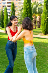 Fototapeta premium Interracial couple of friends laughing together. Friendship concept.
