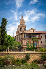 Obraz premium Vertical view of the city of Murcia from the Segura river with the Episcopal palace and the cathedral tower in the background