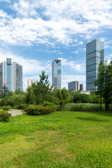 city park with modern building background in shanghai