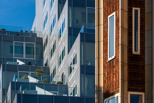 Image of a modern residential building featuring numerous balconies and extensive glass windows, highlighting contemporary urban living and architectural design in Rotterdam