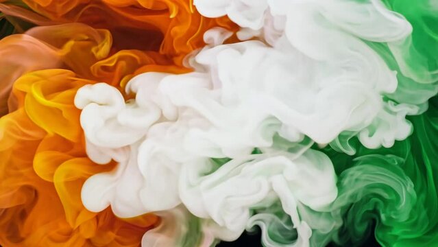 Fluid tricolour smoke Safron, White and Green flowing in the background and text Swatantra Bharat (Independent India) in the foreground, Independence Day Celebration