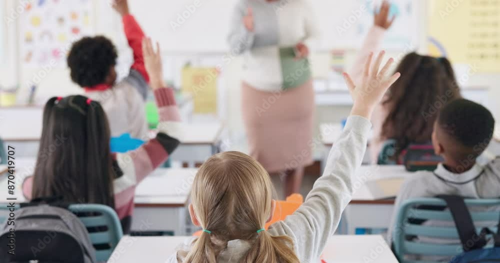 Poster back, children and raised hand for answer in classroom with question, knowledge and learning in educ