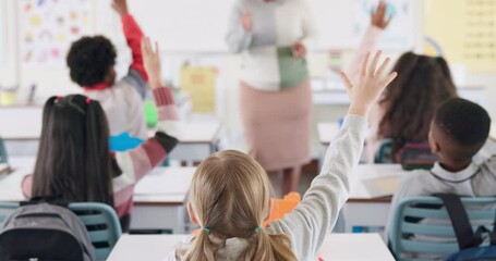 Back, children and raised hand for answer in classroom with question, knowledge and learning in education. Students, diversity group and curious at school with study, solution and feedback for exam