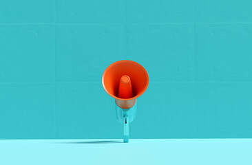 Orange megaphone standing on blue background is making announcement
