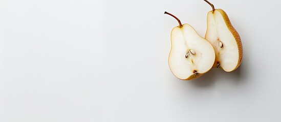 A close-up photo of sliced Aonashi Nijisseiki pear on a plain white backdrop with copy space image.