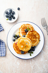 Homemade pancakes with blueberries and honey