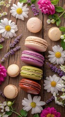 Flat lay photography, macarons in different colors on a wooden table with white and purple flowers 