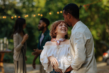 Fototapeta premium Lovely young couple dancing romantically