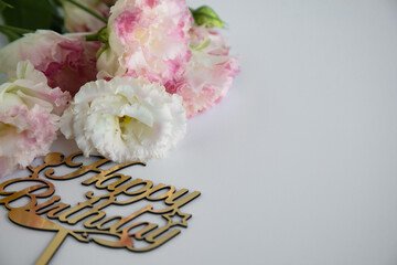 Happy birthday white background with light colors.