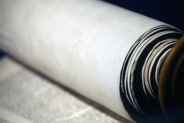 Jewish Museum of Switzerland. Basel.  Old Torah scroll with Hebrew writing. Close-up.  Switzerland.