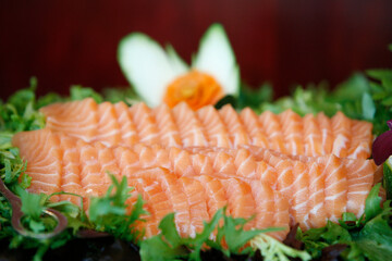 Restaurant buffet.  Raw salmon sashimi. Qatar.