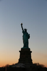 Fototapeta premium Statue of liberty at sunset. New York. USA.