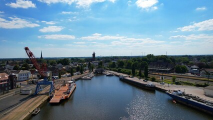 Fototapeta premium Brake Unterweser - Germany - Aerial view of inland port with view of town