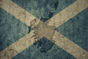 map and flag of scotland on a old vintage crack paper background .
