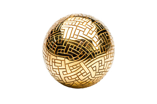a gold ball with a pattern on it