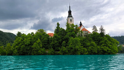Fototapeta premium Bled Lake with its surroundings on cloudy spring day, Slovenia