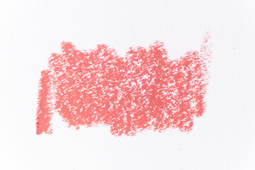 Pink lip liner texture, macro on white background.