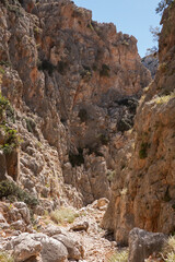 Narrow passage through a gorge in limestone rock 