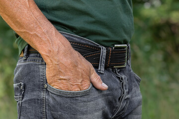 Black men's leather belt.Men's accessories, casual wear.