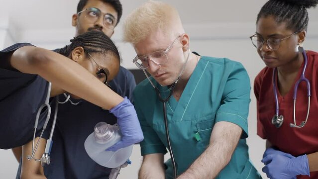 First aid training. Students are learning how to use a bag valve mask