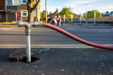 Fire hydrant connection point to supply water on road in england uk