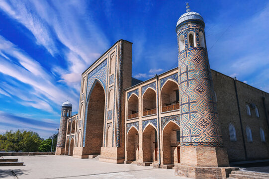 ancient stone Uzbek Islamic Kukeldash madrasah in Tashkent in Uzbekistan. Old medieval madrassa in Asia in spring