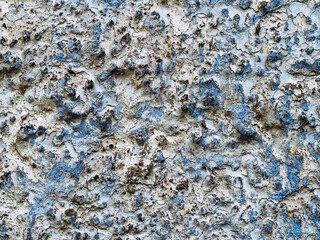 Old white, blue painted wall.