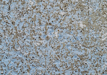 Old white, blue painted wall.