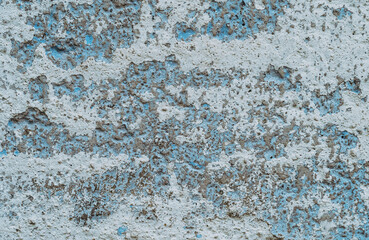 Old white, blue painted wall.