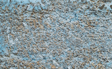Old white, blue painted wall.